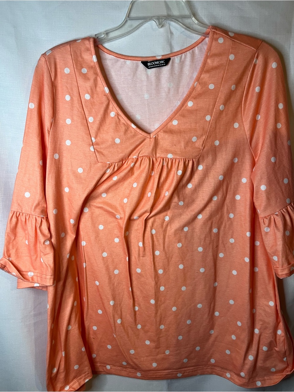 BloomChic Coral Polka Dot V-Neck Blouse
